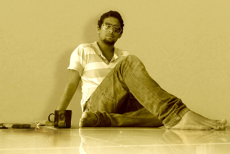 Man Sitting on Floor — Sepia