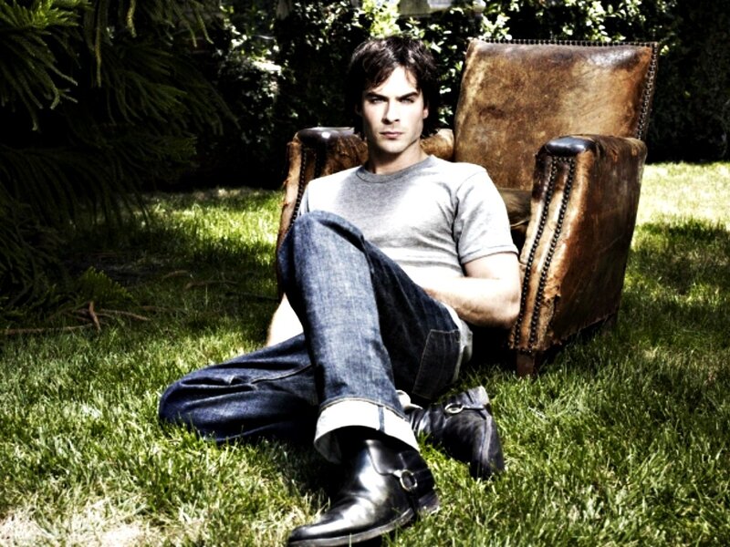Man Sitting on Lawn