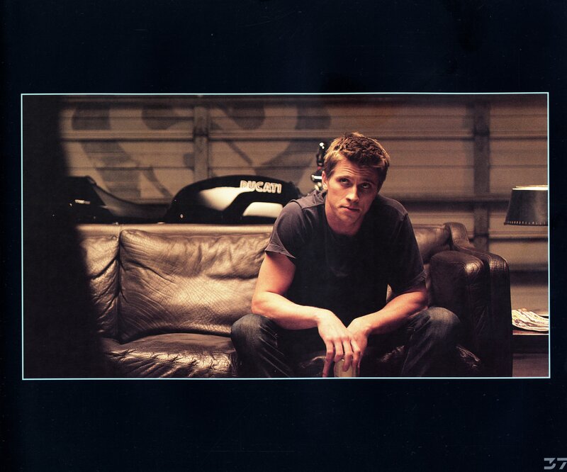 man sitting on leather couch