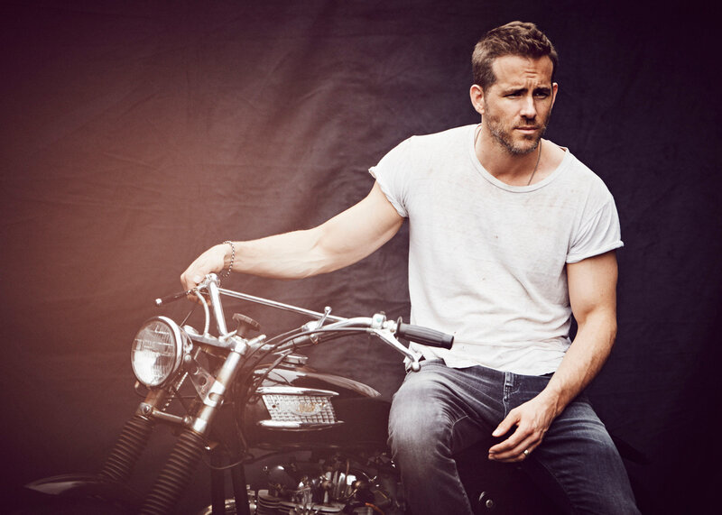 man sitting on motorcycle