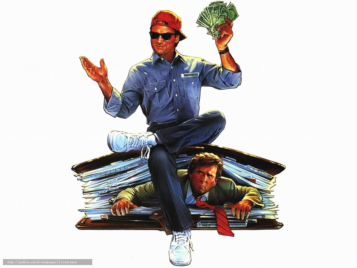 man sitting on pile of papers