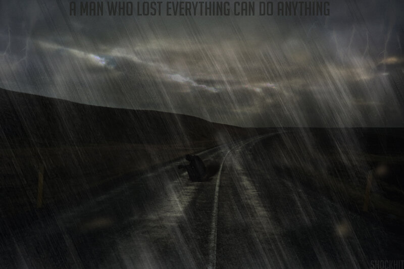 Man Sitting on Road