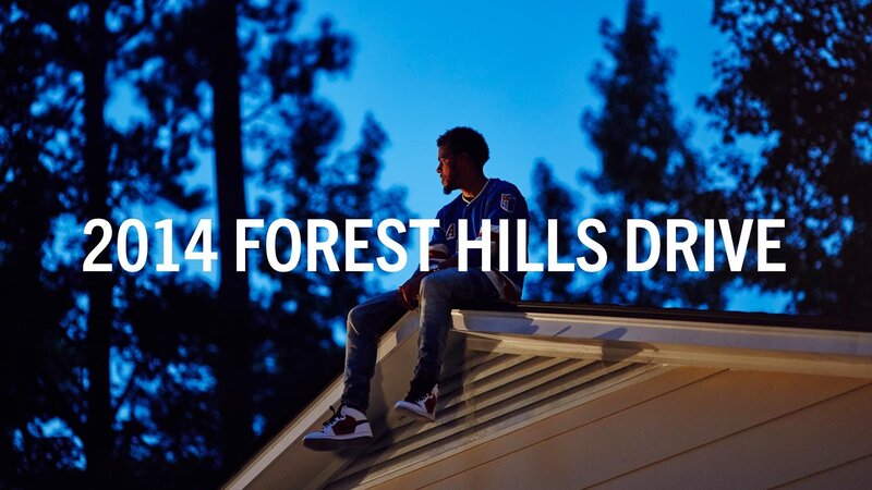 Man Sitting on Roof