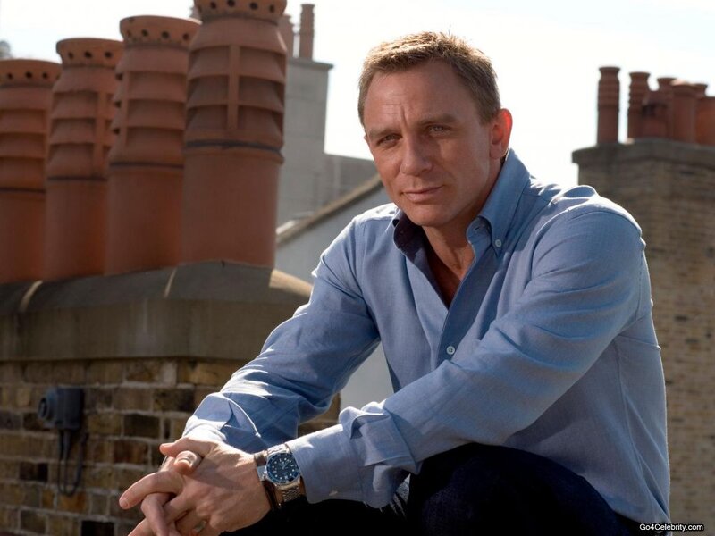 Man Sitting on Rooftop — Blue