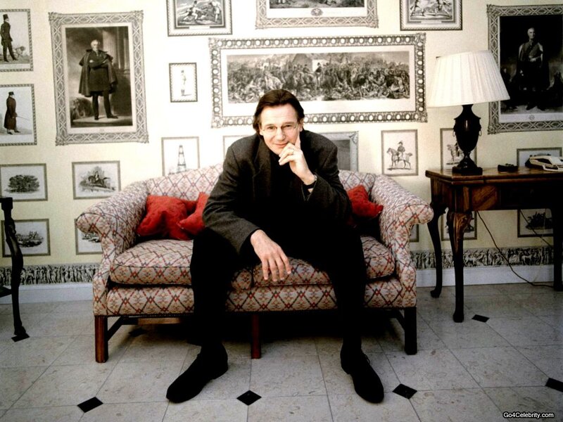 Man Sitting on Sofa