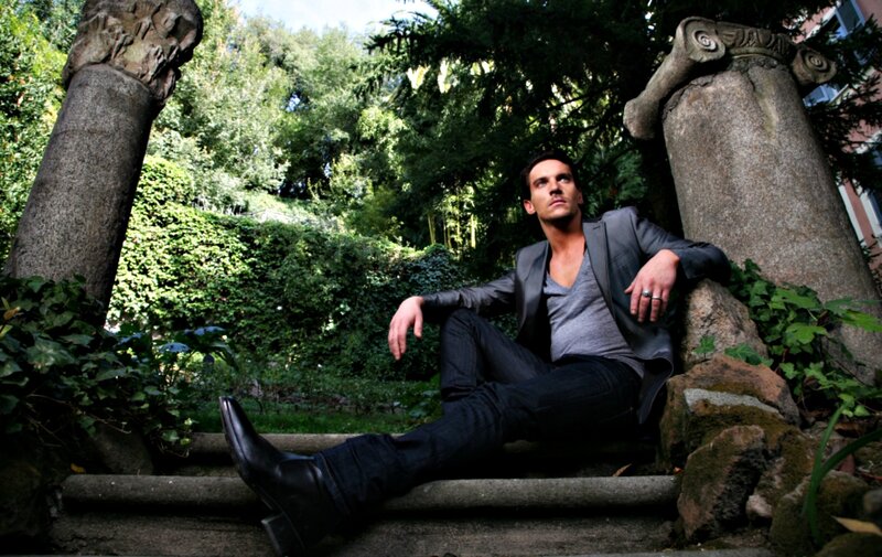 Man Sitting on Steps — Green