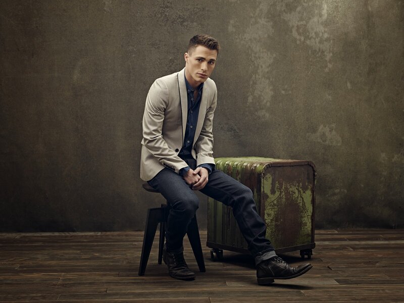 Man Sitting on Stool — Brown
