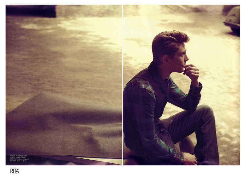 man sitting on street