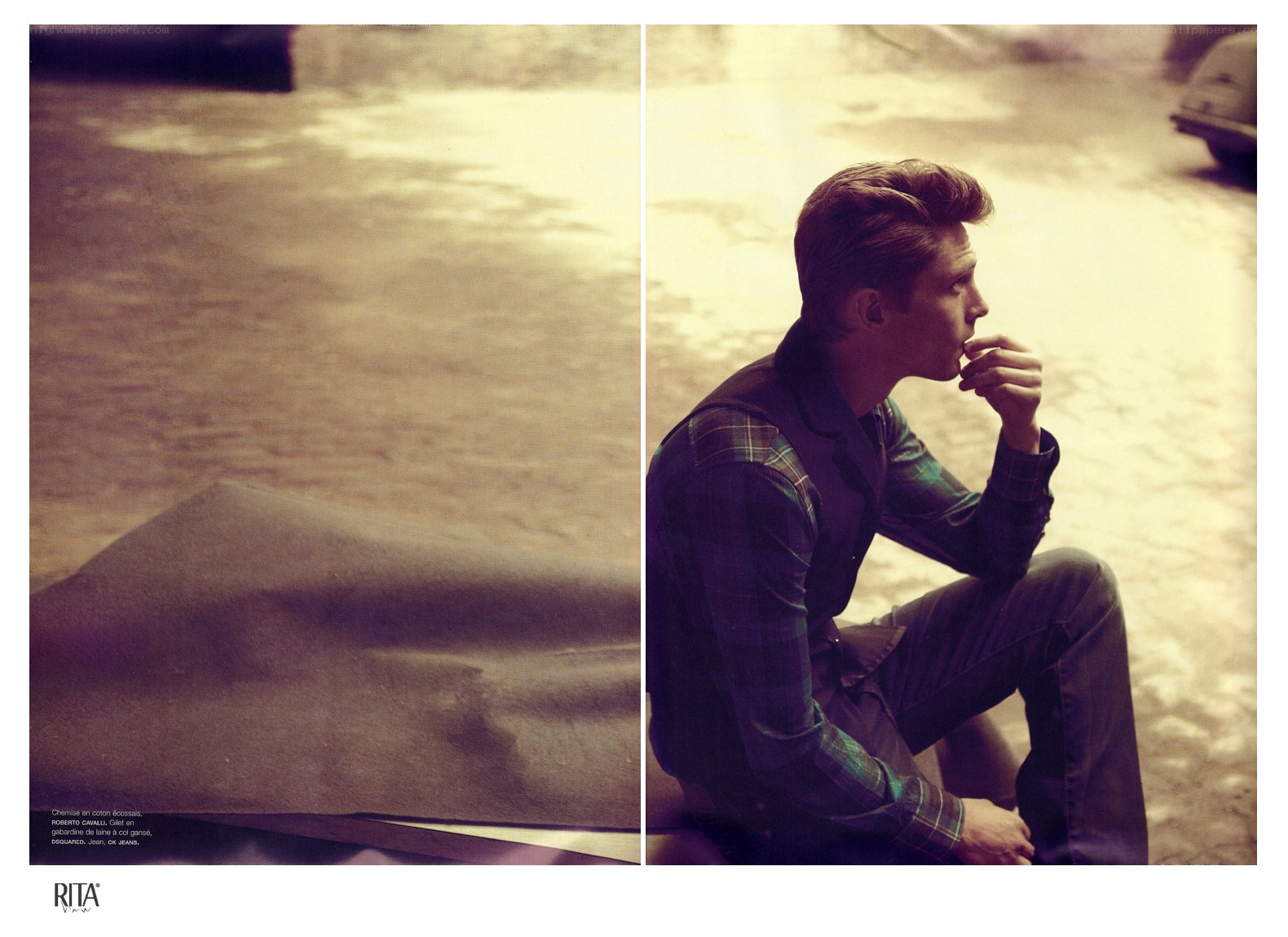 man sitting on street