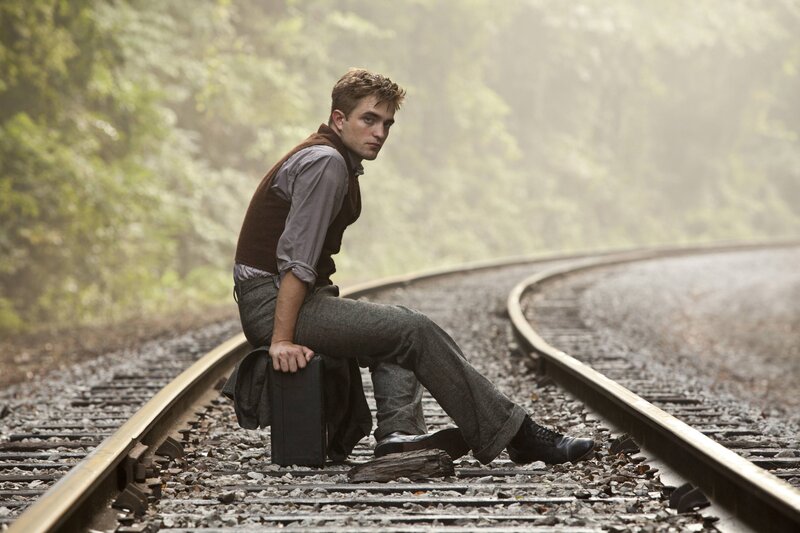 Man Sitting on Train Tracks — Green, Melancholic