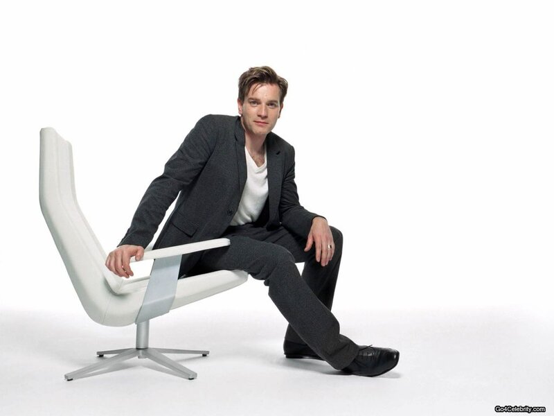 Man Sitting on White Chair — Neutral, Photograph