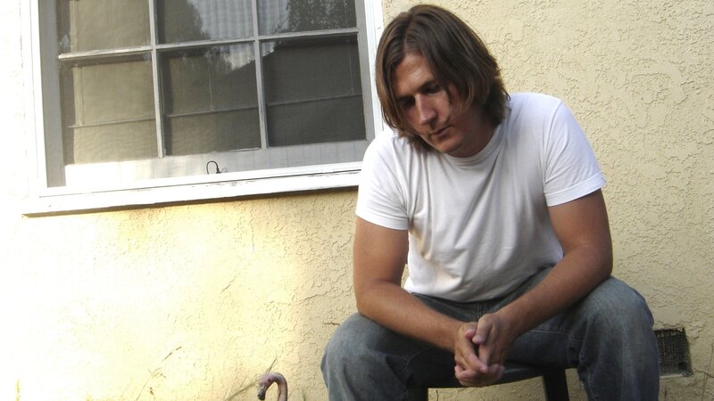 man sitting outside
