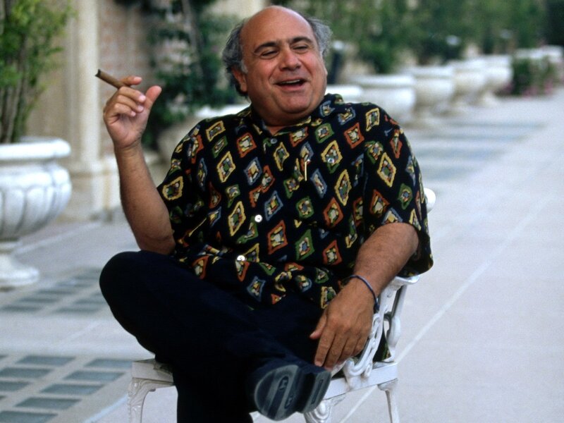 man sitting with cigar