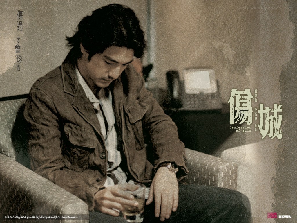 man sitting with drink