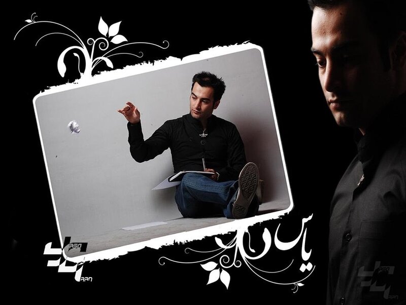man sitting with notebook