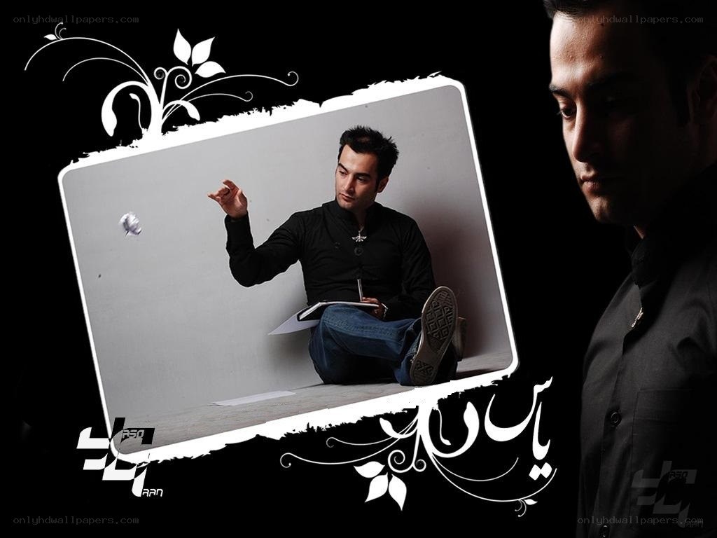 man sitting with notebook