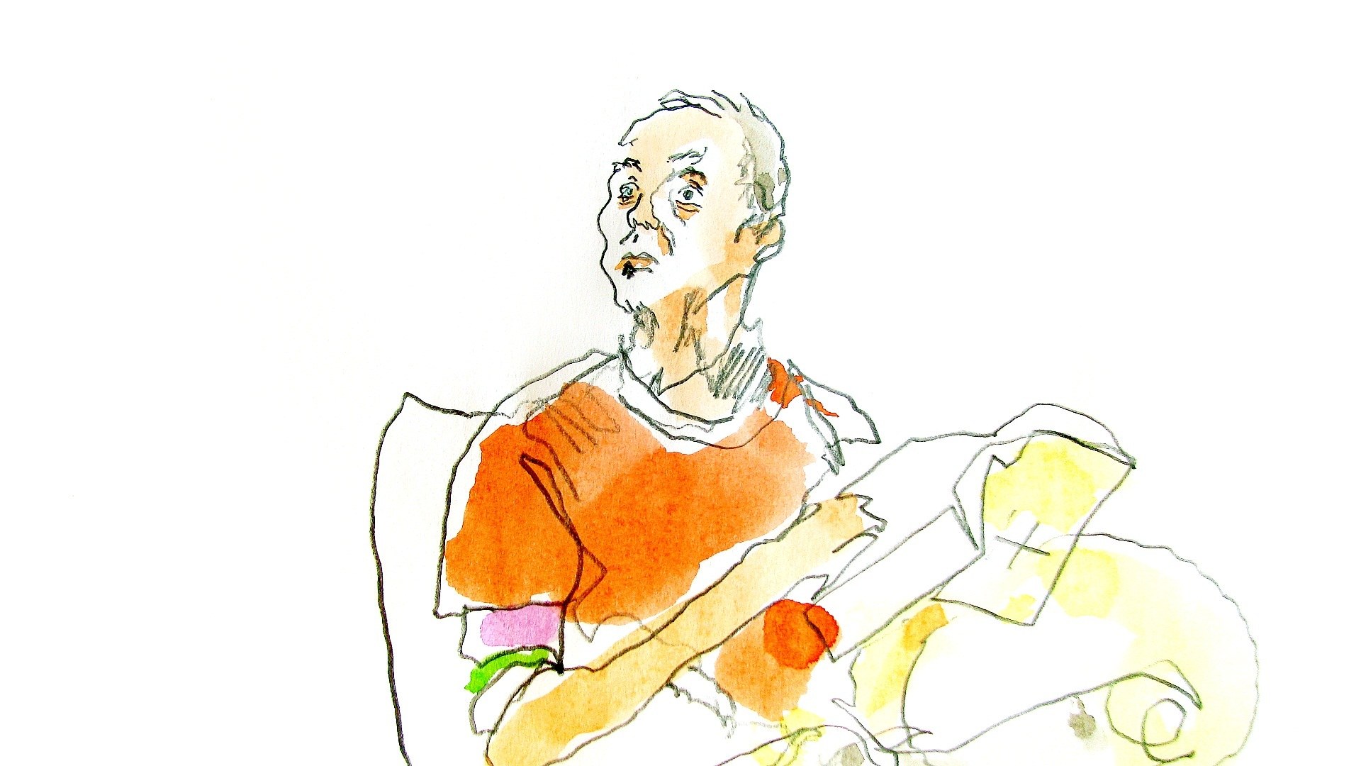 man sitting with papers