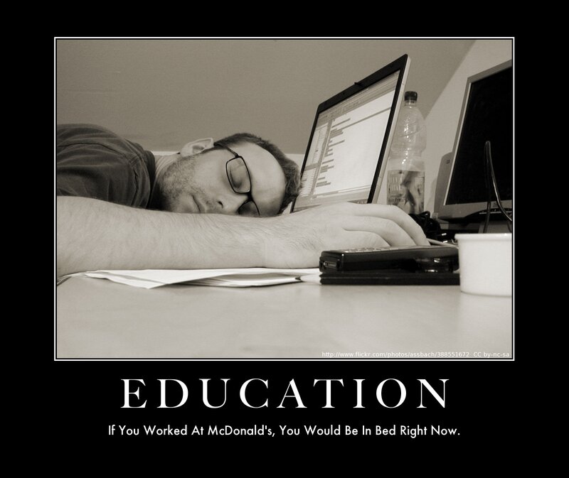 man sleeping at desk