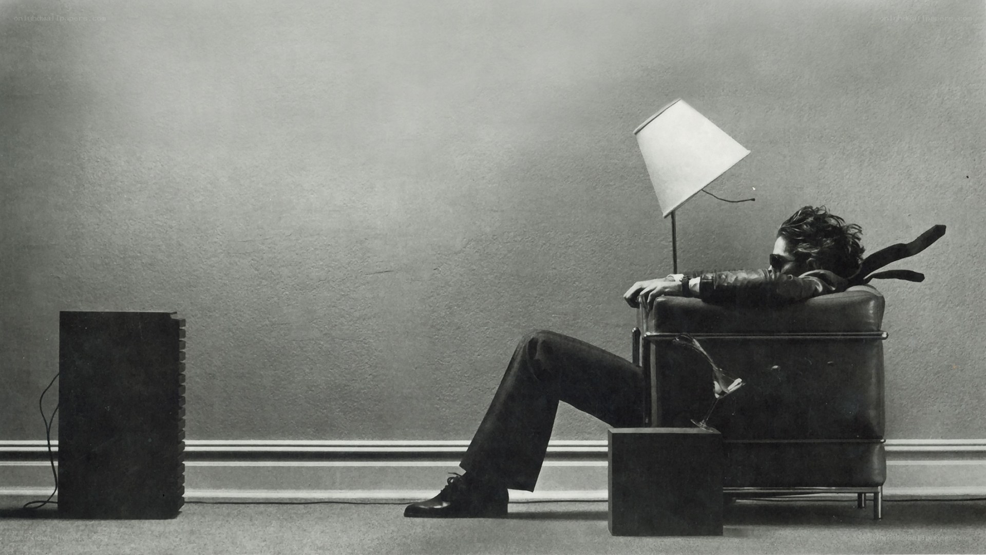 man sleeping in armchair