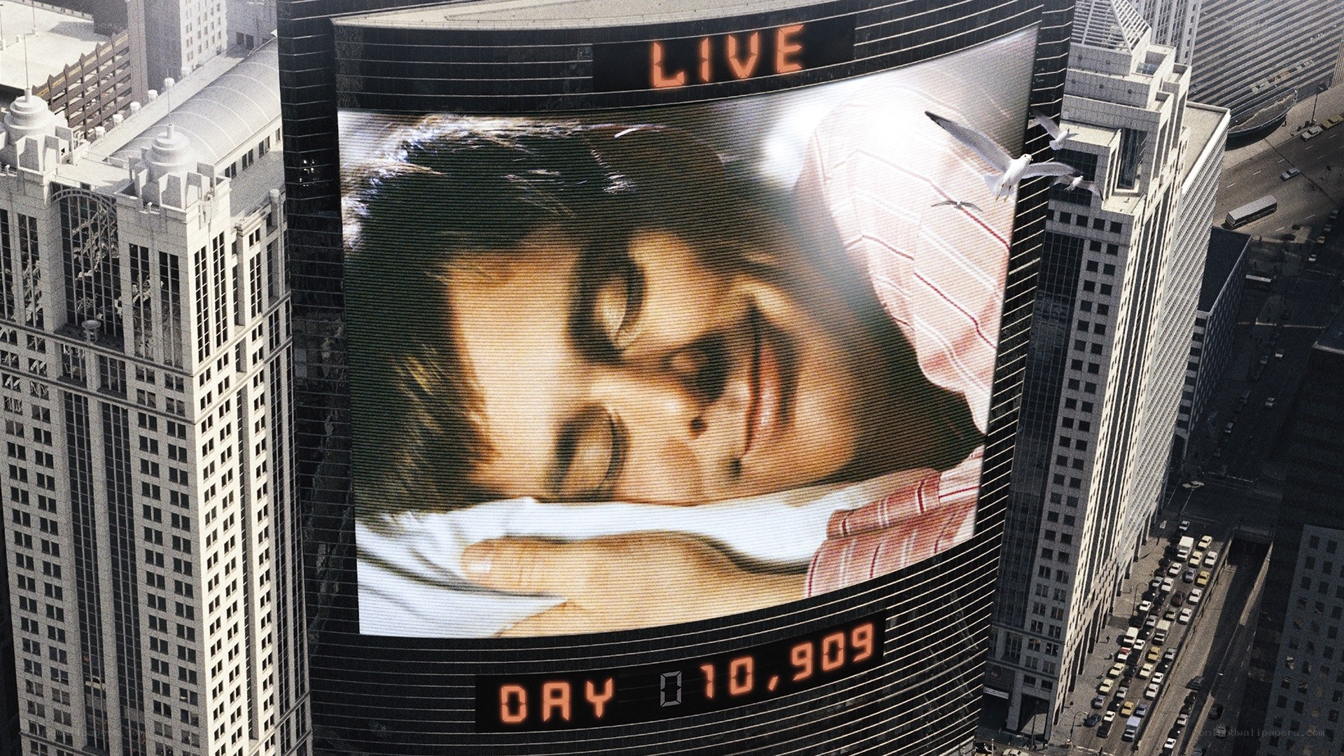 Man sleeping on billboard