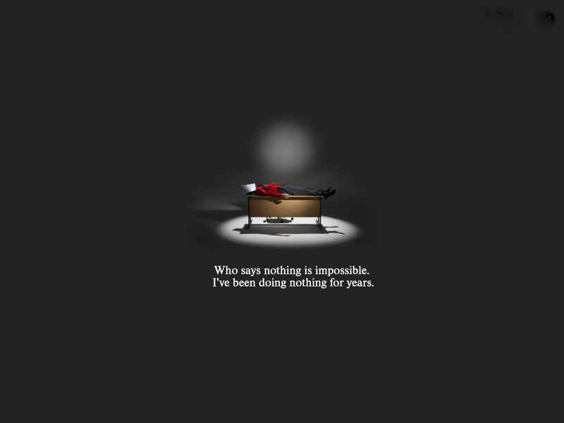 man sleeping on desk