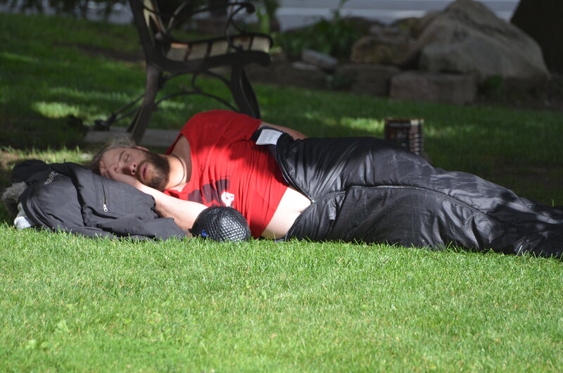 Man Sleeping on Grass