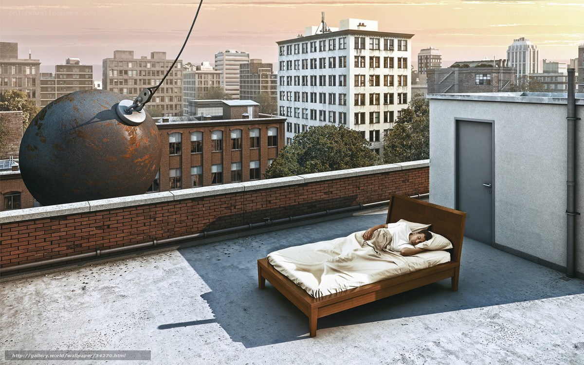 Man sleeping on rooftop with wrecking ball