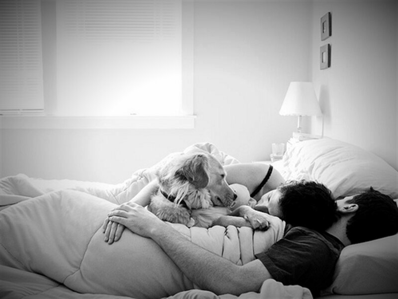Man Sleeping with Dog