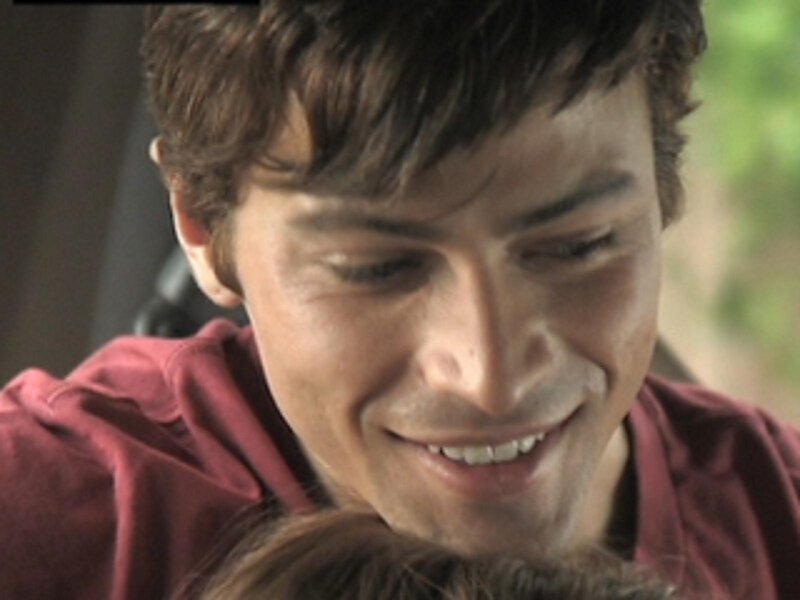 man smiling at child
