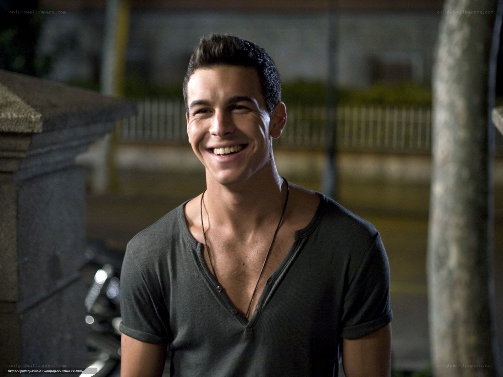 man smiling at night