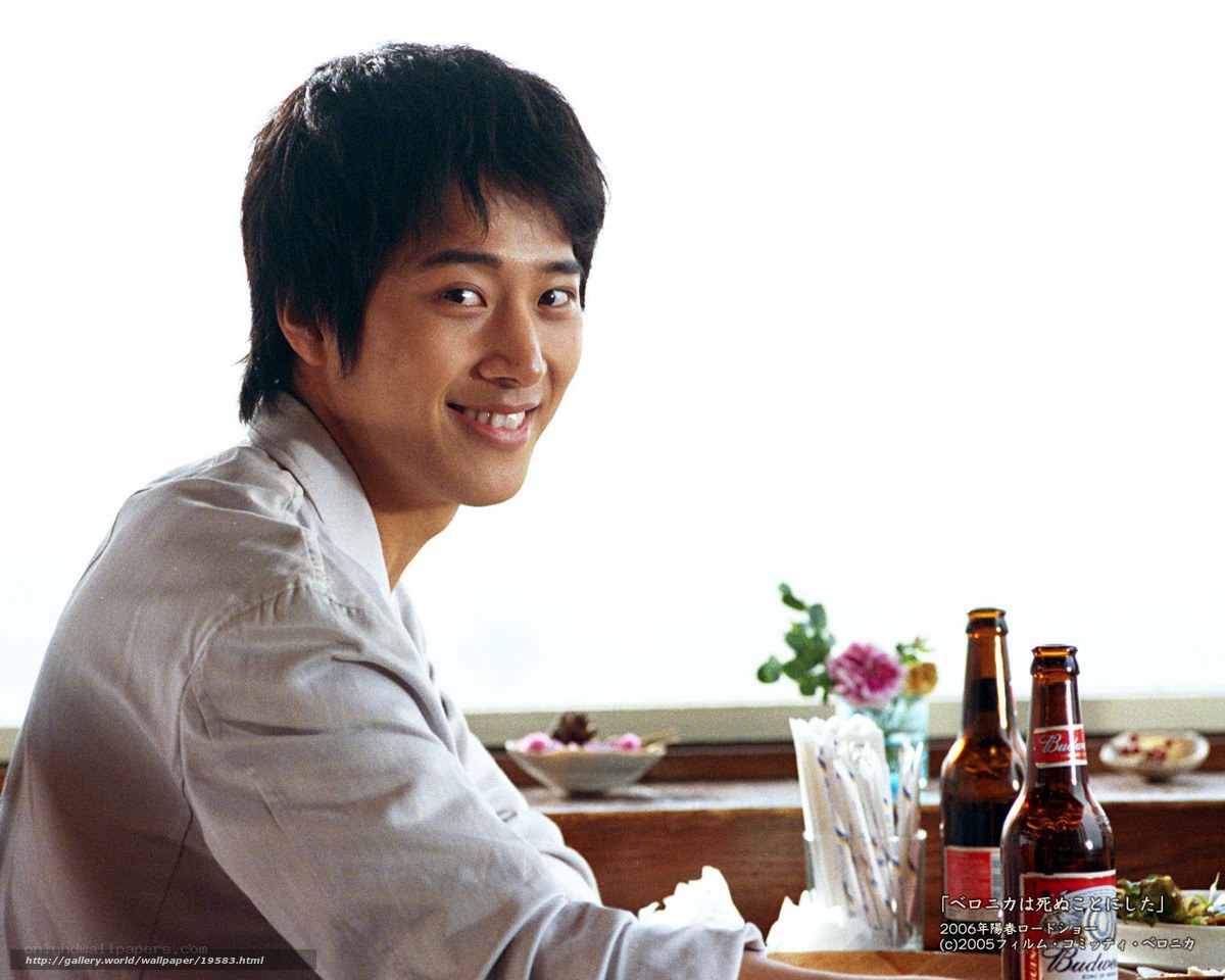 man smiling at table