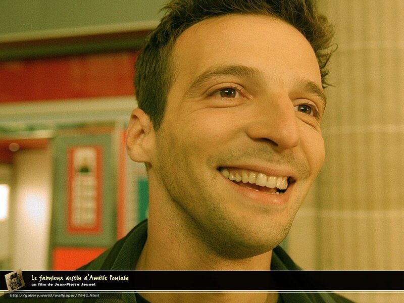 man smiling in film scene