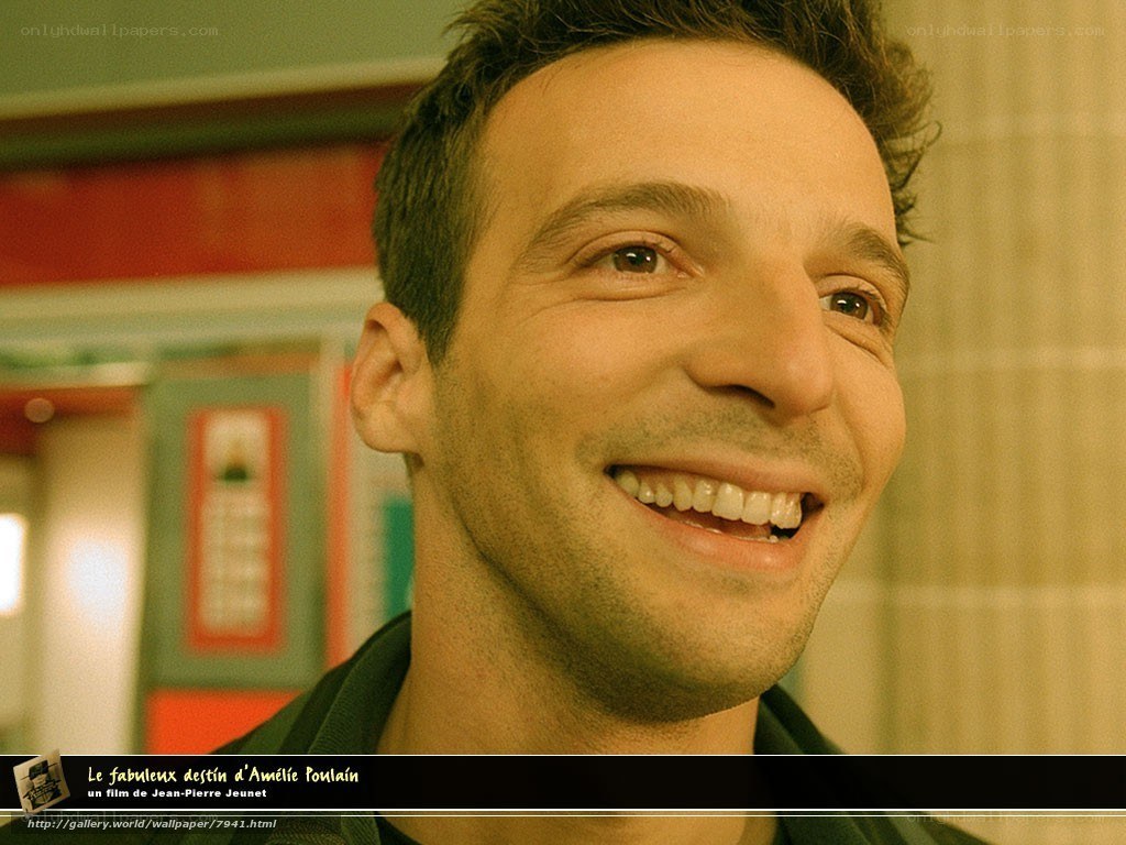 man smiling in film scene