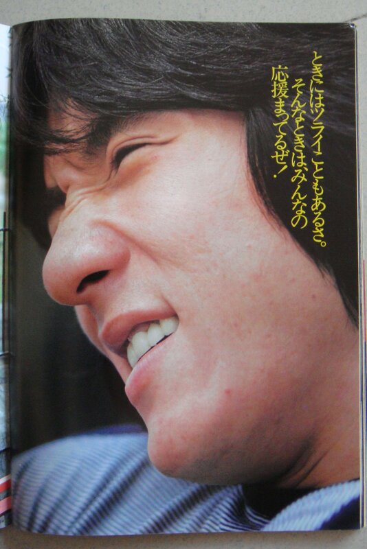 man smiling in magazine