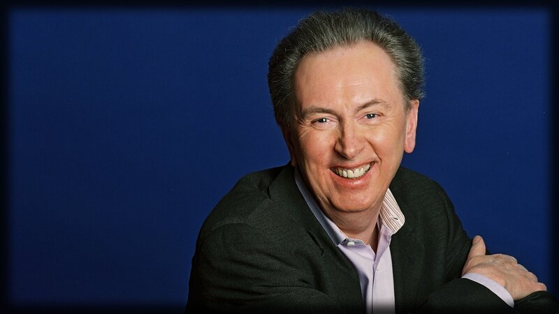 man smiling in suit