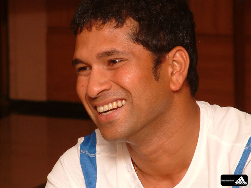 Man Smiling in White Shirt — Happy
