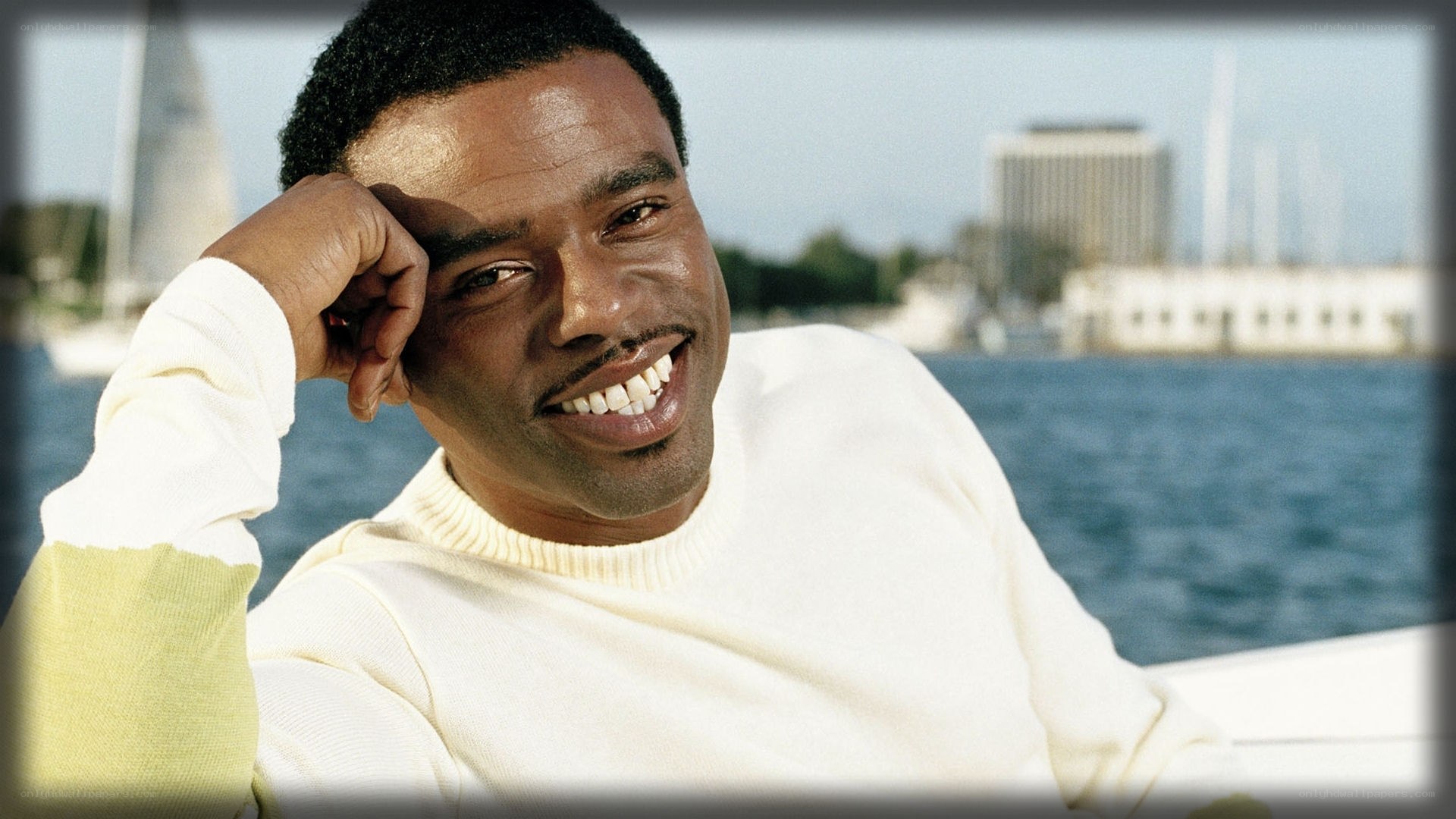 man smiling on a boat