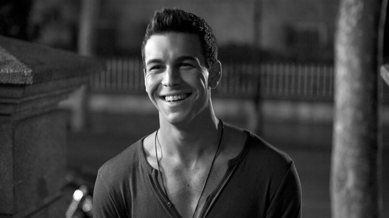 Man Smiling Outdoors — Black