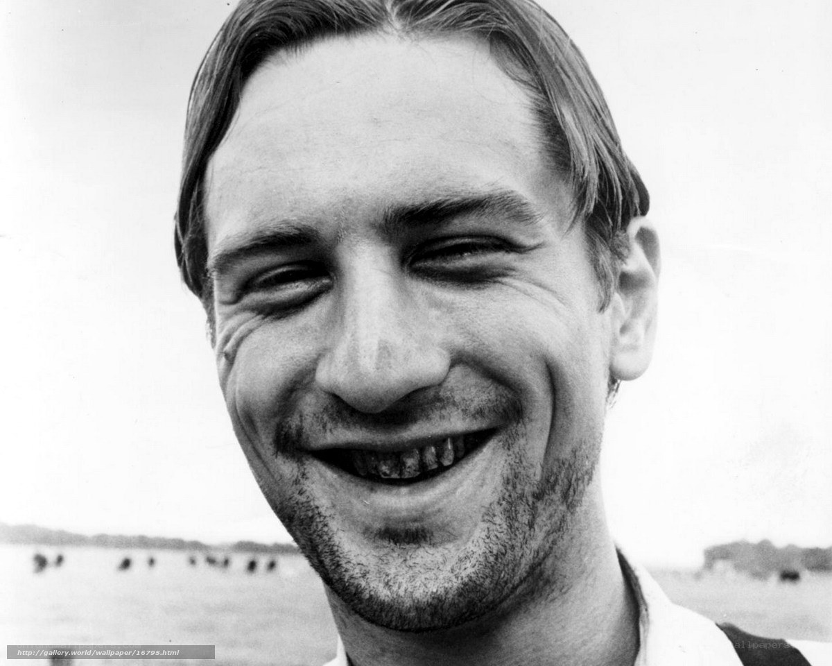 man smiling outdoors