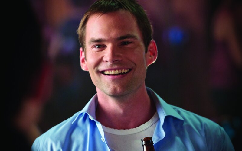Man Smiling with Beer