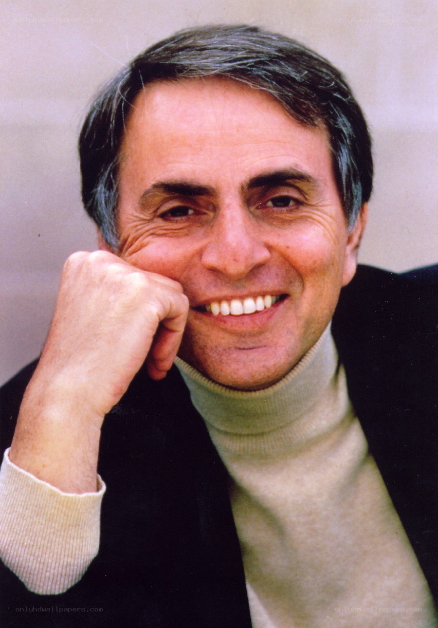 man smiling with hand on chin