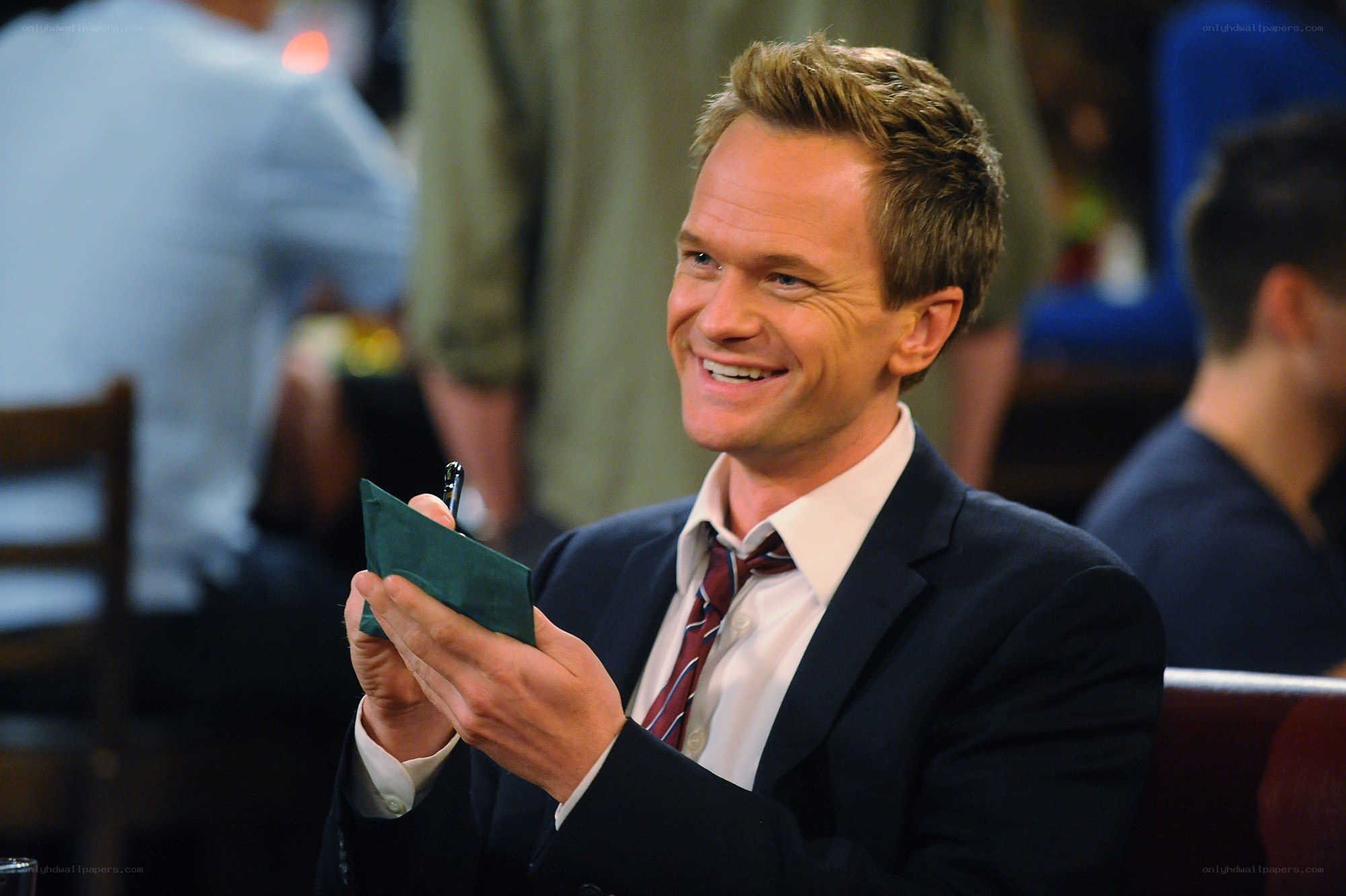 man smiling with phone