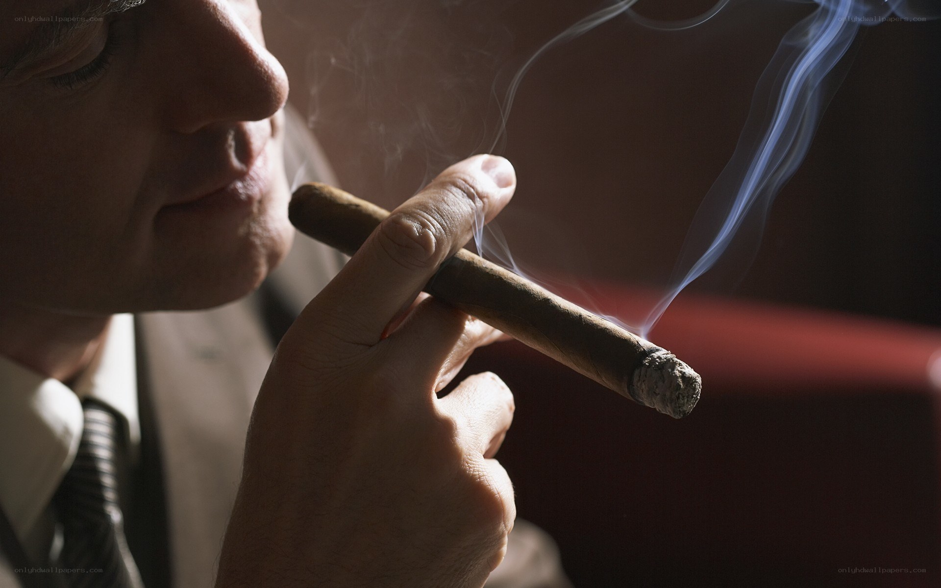 man smoking a cigar