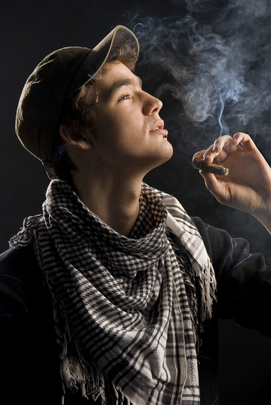 man smoking a cigar