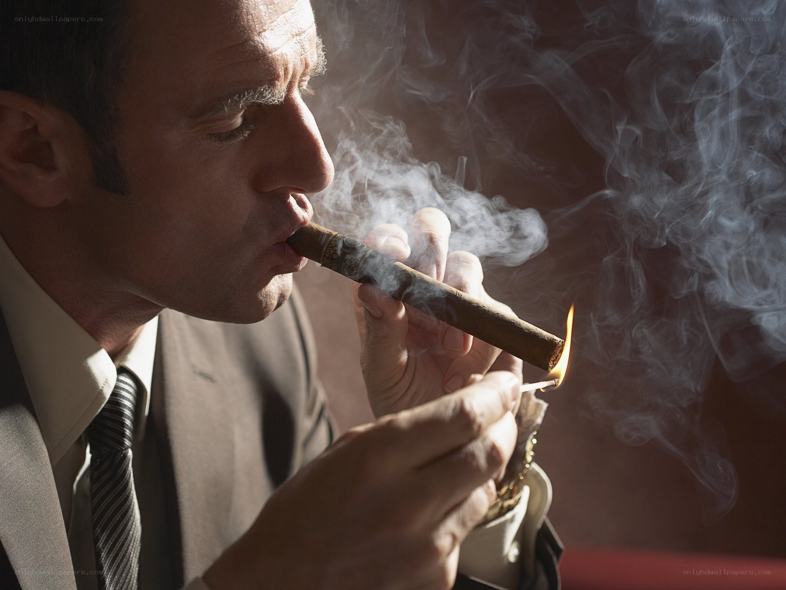 man smoking a cigar