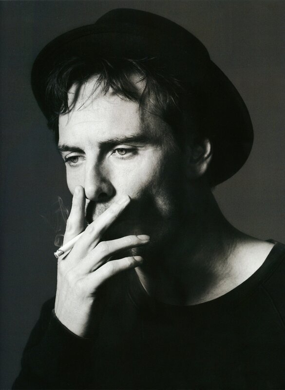 man smoking a cigarette