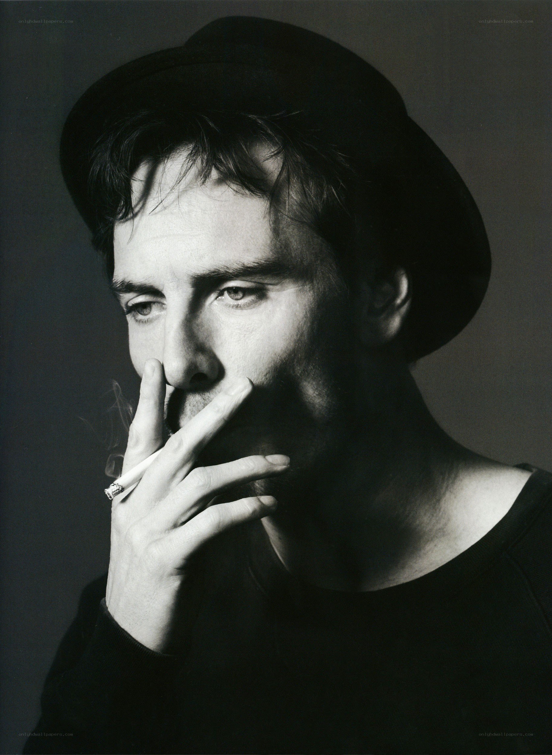 man smoking a cigarette