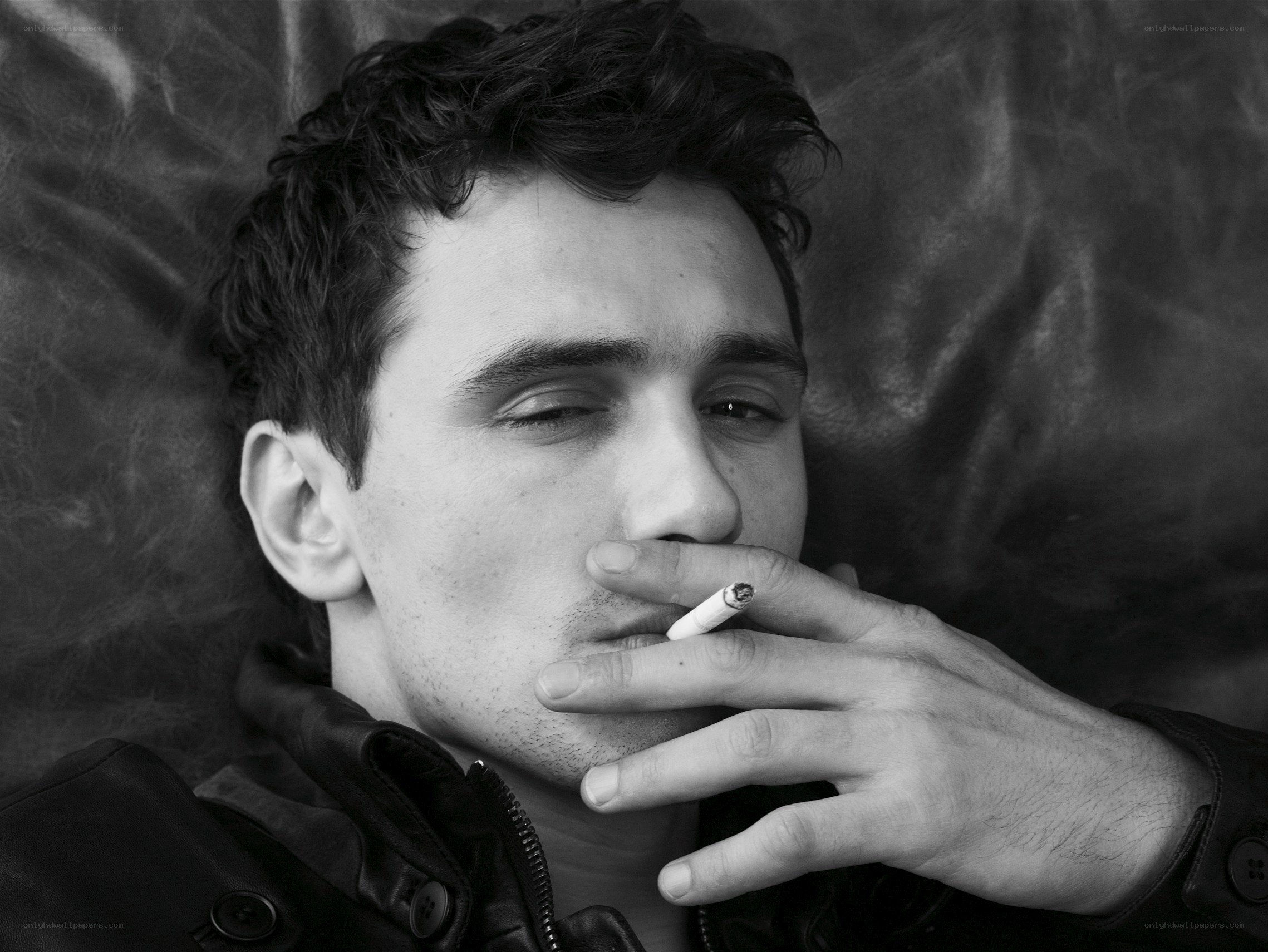 man smoking a cigarette
