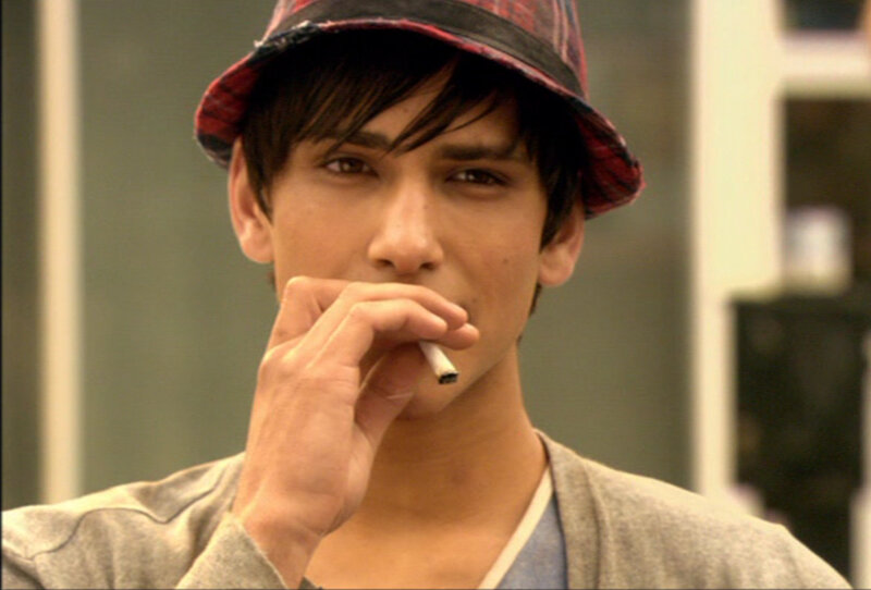 man smoking a cigarette