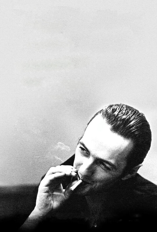 man smoking a cigarette